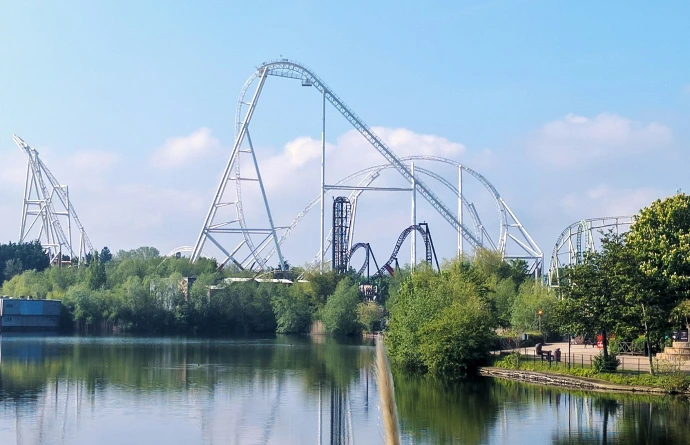 a roller coaster over a body of water